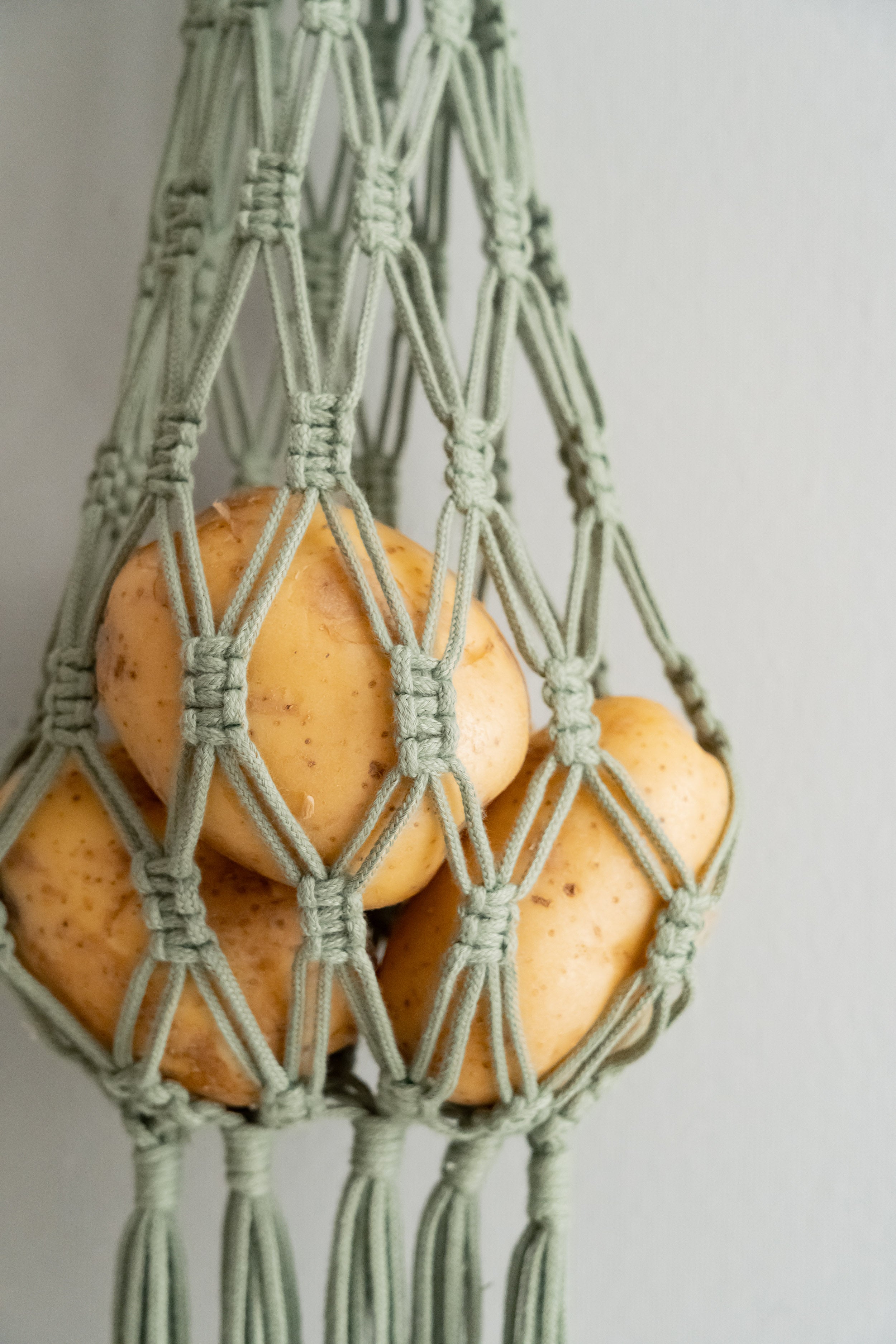 Cesta colgante de macramé para frutas, solución de almacenamiento de pared estilo bohemio